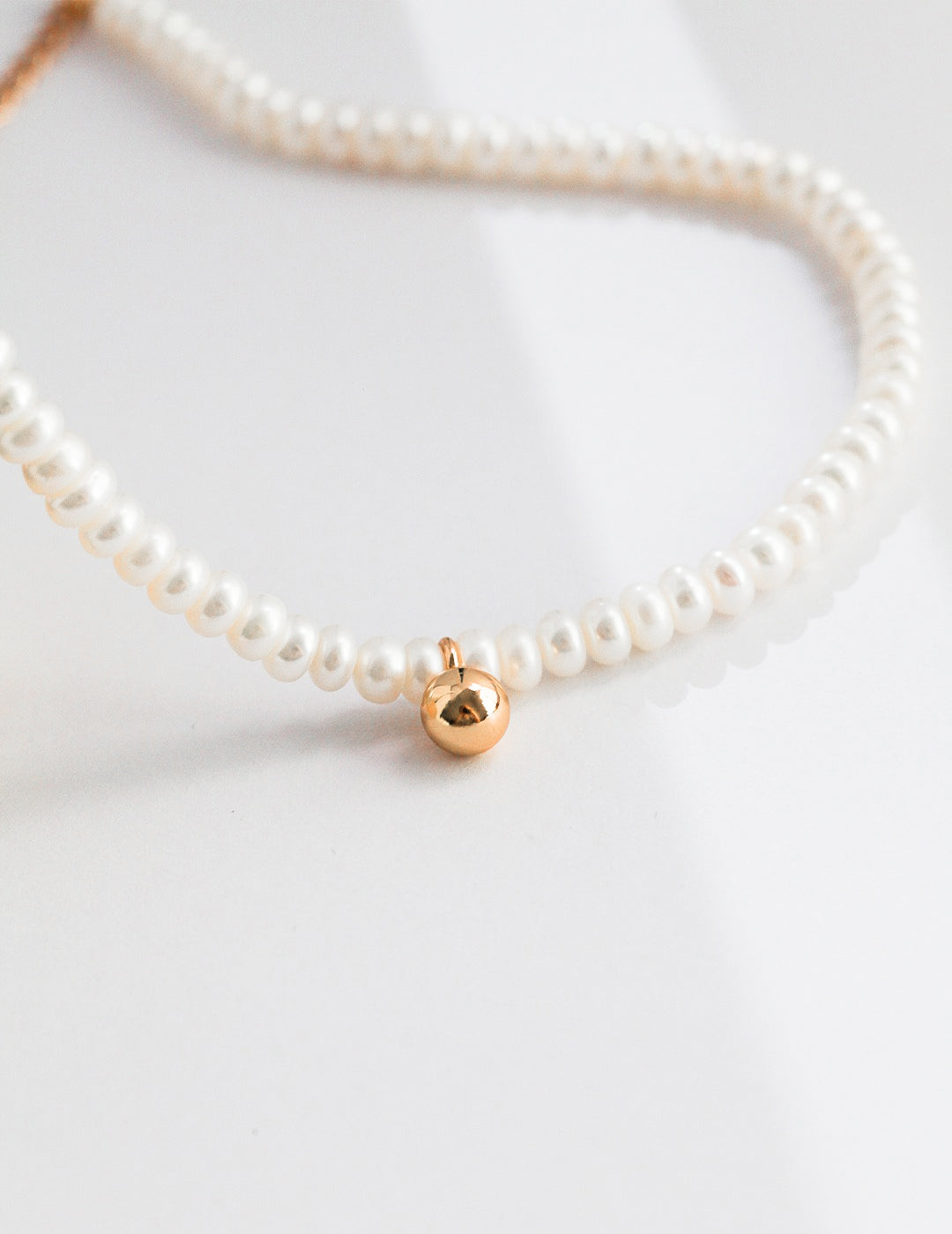 SIMPLISTIC BAROQUE PEARL NECKLACE