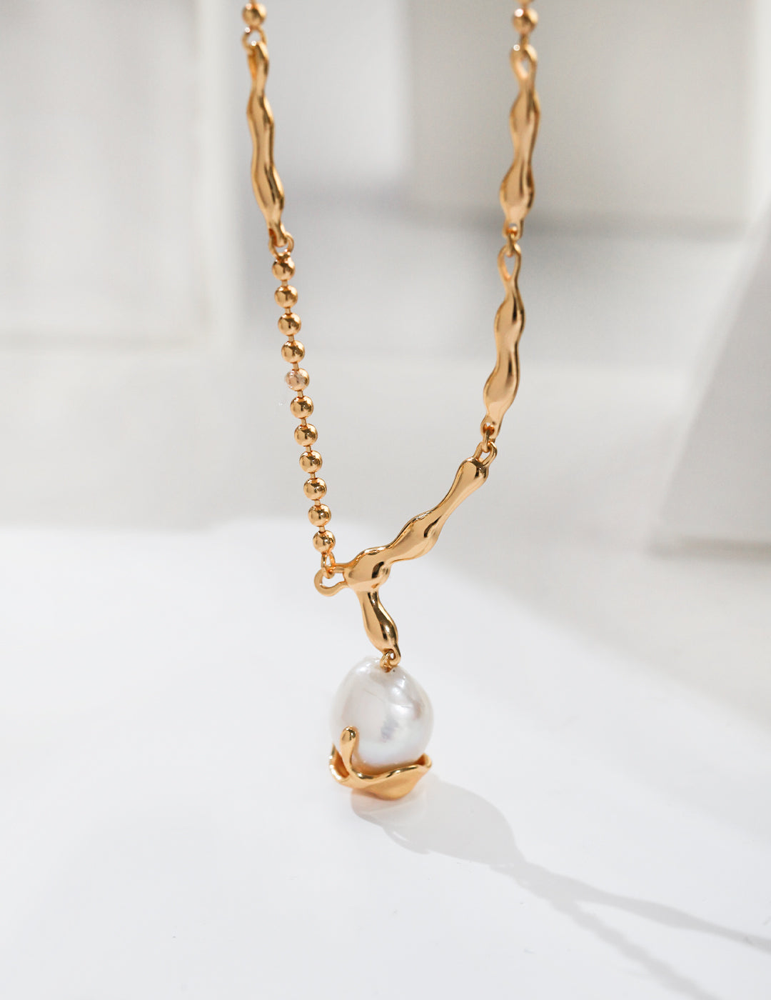 FLOW BAROQUE PEARL NECKLACES